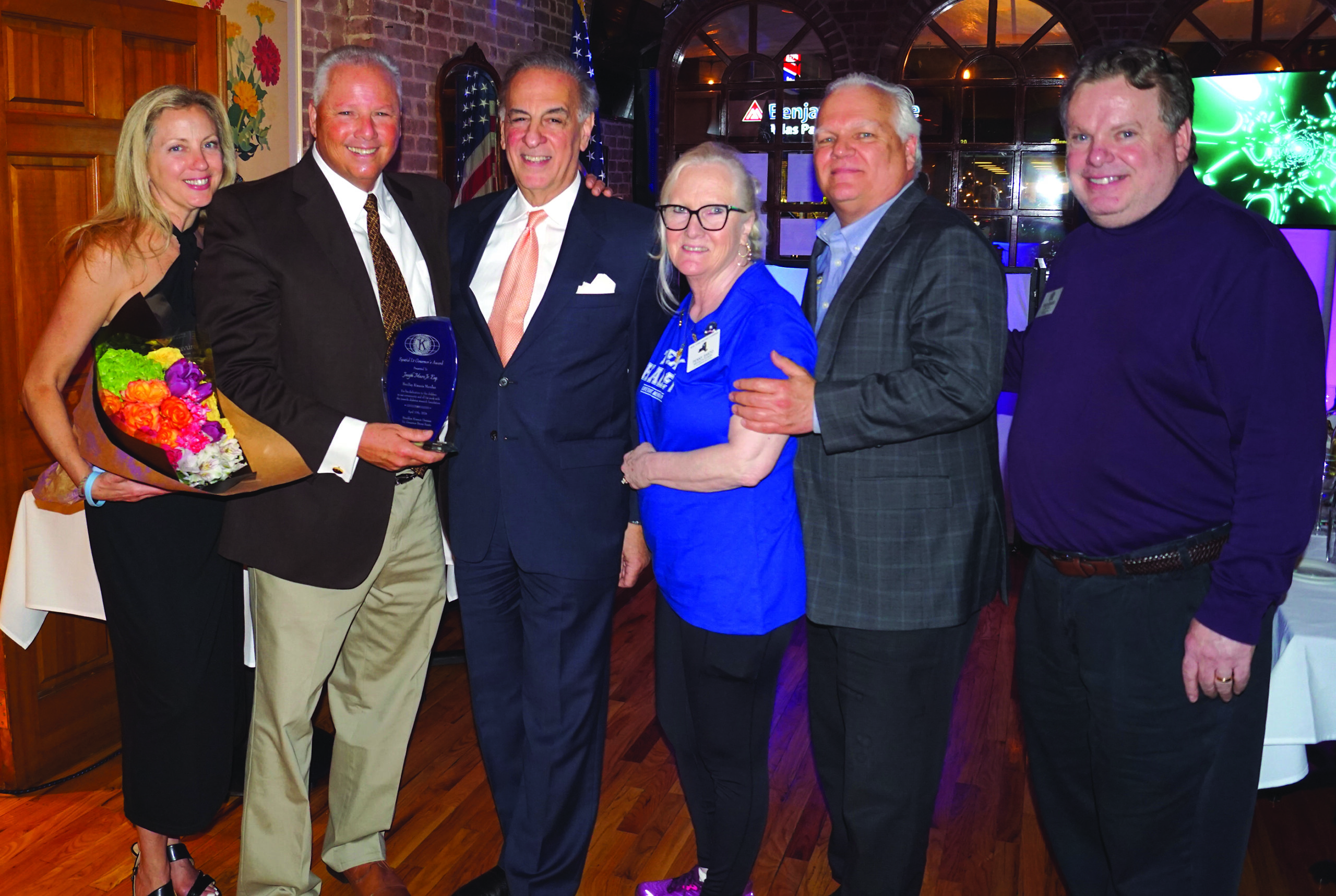 Ben-Bay Kiwanis Foundation, Inc. board member Joseph Mure Jr. (second from left) received the Lieutenant Governor’s Award for his dedication to children in the community at last year’s “Haley Girl” event. He was congratulated by Jodi Tucci, former Brooklyn Kiwanis Lt. Gov. James Orlando and then-Brooklyn Kiwanis Lt. Gov. Penny Santo (left to right). Eagle Urban Media/File photo