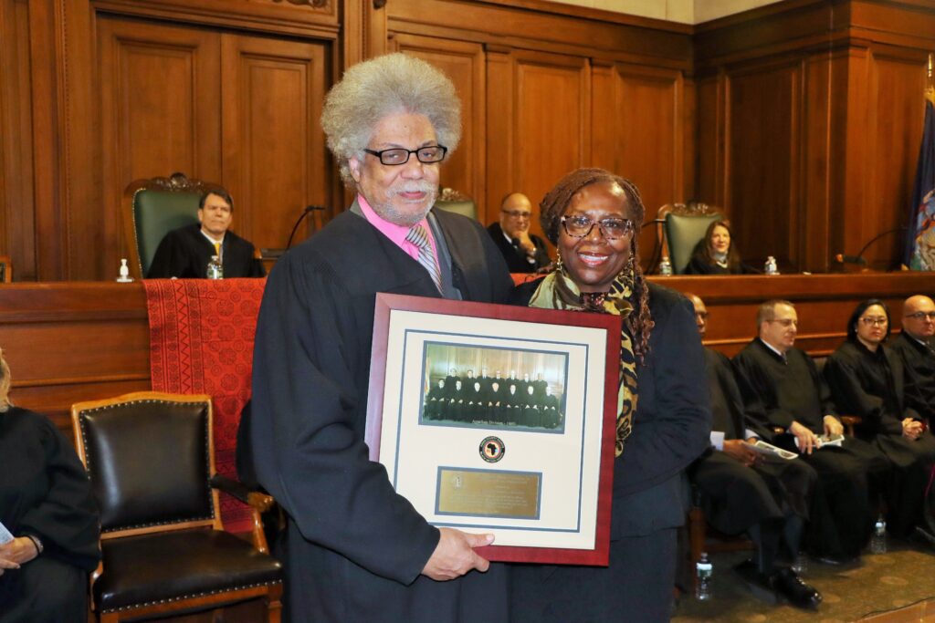 Hon. Paul Wooten presents the Thompson award to Hon. Cenceria Edwards. Brooklyn Eagle photo by Mario Belluomo