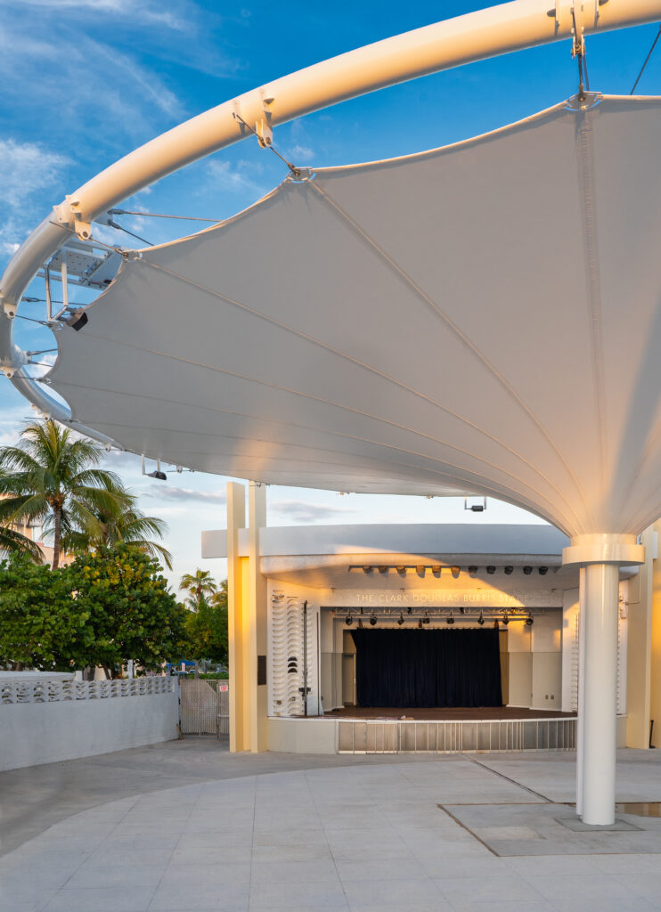 The Rhythm Foundation asked Pvilion to create a solar-powered canopy for shade and rain protection. They delivered a functional work of art inspired by Miami Modern architect Norman N. Giller. It features an enhanced drainage system, turtle-friendly lights and a 70’ canopy that can withstand most Florida wind thresholds or retract for a hurricane. Photo courtesy of Pvilion