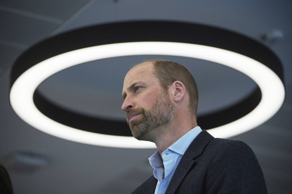 Prince William listens to people speaking during a visit to the Mental Health Innovations (MHI), a charity established in 2017 by The Royal Foundation of The Prince and Princess of Wales, in London, Thursday, March 6, 2025.