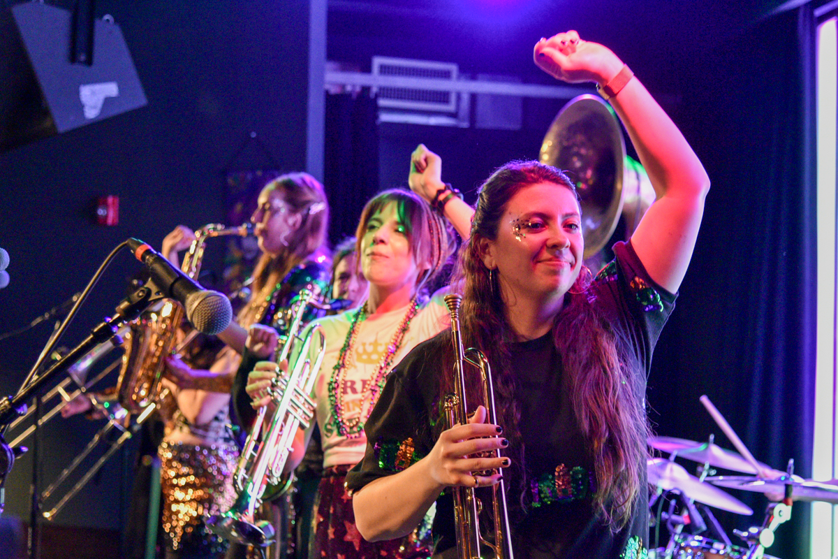 Towards the end of their second set at Littlefield in Gowanus, Alex Harris leads the Brass Queens into the audience. Photo by Beth Eisgrau-Heller
