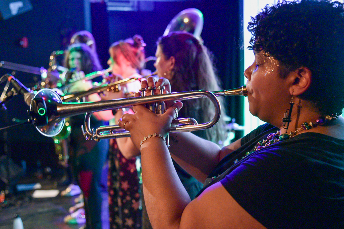 Trumpet player Minerva Johnson deep in concentration during the finale of the Brass Queens set at Littlefield on Tuesday, March 4, 2025. Photo by Beth Eisgrau-Heller