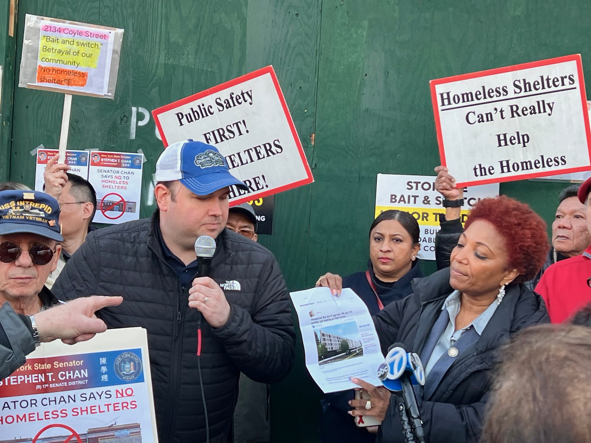 Councilmember Mercedes Narcisse (D-46) holds up a photo of the proposed affordable housing with Troy Olson from Council Member Inna Vernikov’s office. Photo by Loretta Chin