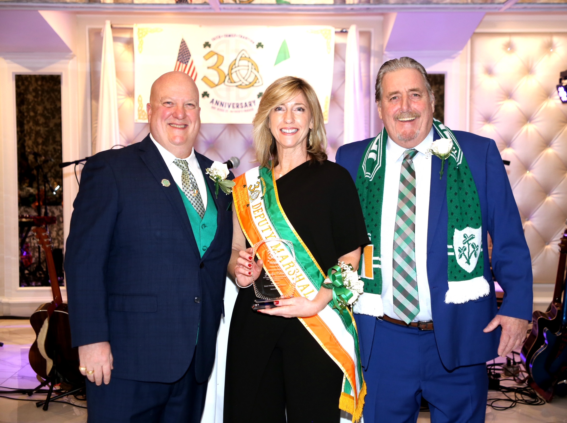 Richie O’Mara (left) alongside Deputy Marshal Jennifer Potter; John Bennett, parade VP (right). Photo by Arthur De Gaeta