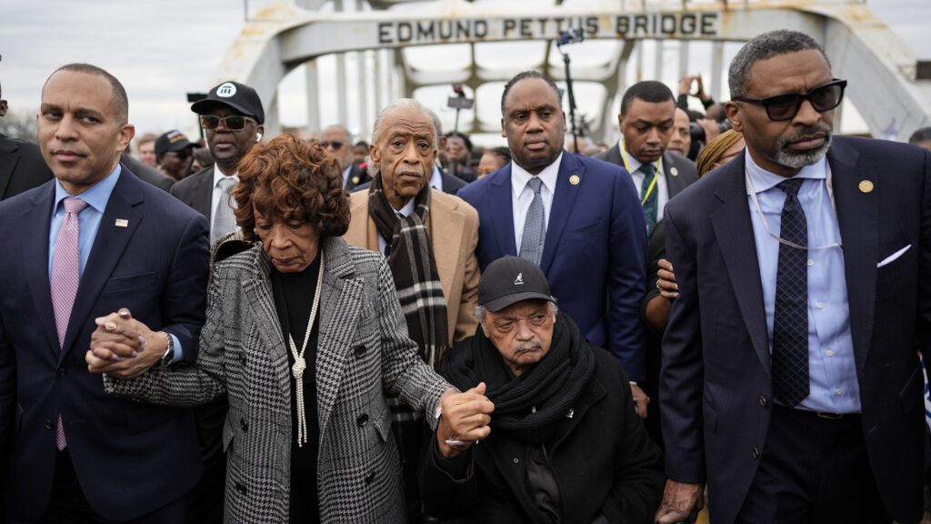 U.S. Rep. Hakeem Jeffries, D-NY, U.S. Rep. Maxine Waters, D-Calif., Rev. Al Sharpton, Rev. Jesse Jackson and NAACP President Derrick Johnson, from left, march across the Edmund Pettus bridge during the 60th anniversary of the march to ensure that African Americans could exercise their constitutional right to vote, Sunday, March 9, 2025, in Selma, Ala.