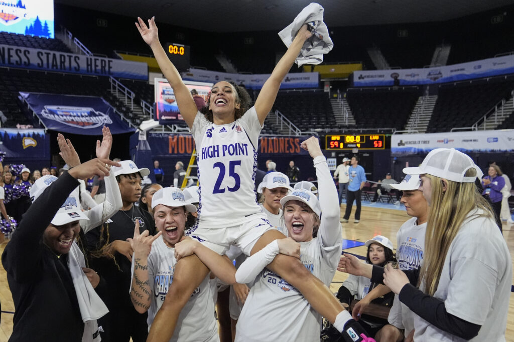 High Point guard Aaliyah Collins (25) celebrates with teammates after winning the Big South Championship NCAA college basketball game against Longwood, Sunday, March 9, 2025, in Johnson City, Tenn.