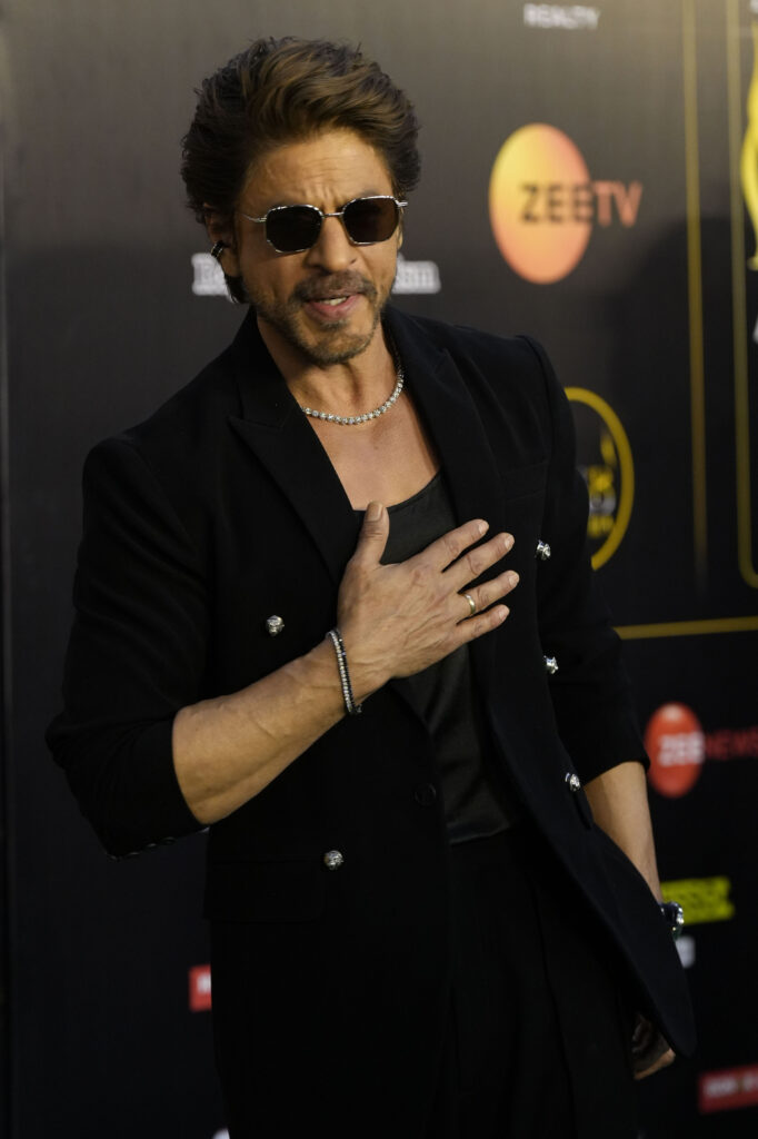 Indian Bollywood actor and film producer Shah Rukh Khan poses for a photograph as he arrives for the International Indian Film Academy (IIFA) awards ceremony in Jaipur, India, Sunday, March 9, 2025.