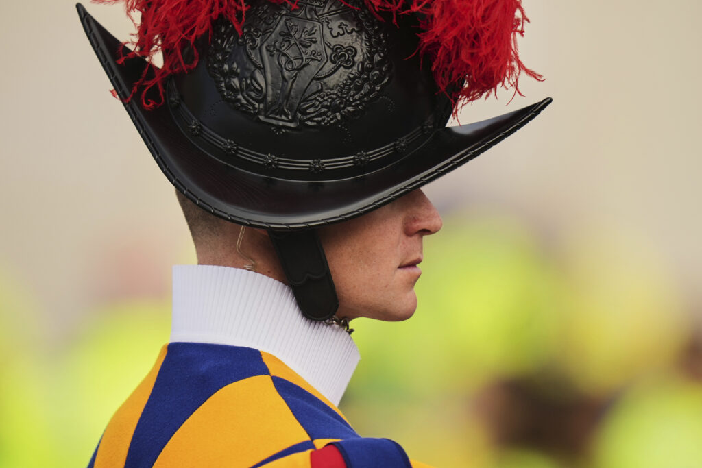 A Vatican Swiss guard stands prior to a mass for the world of volunteers led by delegate of Pope Francis Cardinal Michael Czerny in St. Peter's Square at The Vatican, Sunday, March 9, 2025.