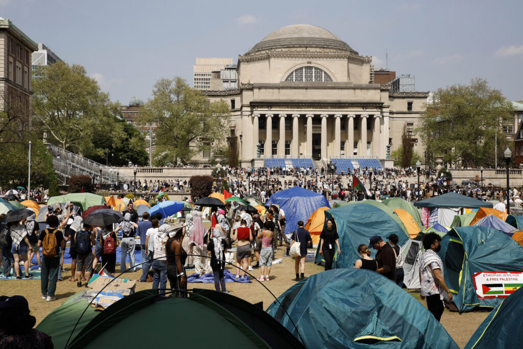 Student protesters gather inside their encampment on the Columbia University campus, April 29, 2024, in New York. AP Photo/Stefan Jeremiah, File