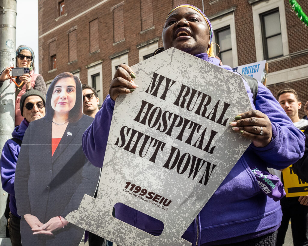 Union delegate for 1999 SEIU Shauntal Hinkson speaks at a rally outside the Bay Ridge office of Congresswoman Nicole Malliotakis (R-Brooklyn), in Brooklyn, New York, March 22, 2025, protesting her vote to cut funding for federal health care programs and give tax breaks to billionaires. Brooklyn Eagle photo by Gabriele Holtermann