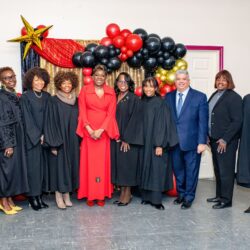 Hon. Sharen Hudson (in red) alongside Kings County judges, Brooklyn District Attorney Eric Gonzalez (in blue) and Deputy Borough President Kim Council (to his left). Photo: Roger Archer/Phaats Photos