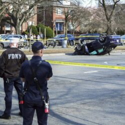 This image provided by the Office of the New York Mayor shows the scene, Saturday, March 29, 2025, in the Brooklyn borough of New York, where a woman driving on a suspended license was speeding and failed to yield after stopping at a red light, collided with another vehicle and then into a family walking in the crosswalk. Photo: Mayoral Photography Office/Justin Persaud via AP