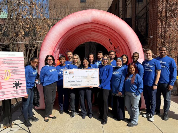 Members of the Colon Cancer Coalition display a recent grant that helps their promotion of screening and education. Photo courtesy of The Brooklyn Hospital Center