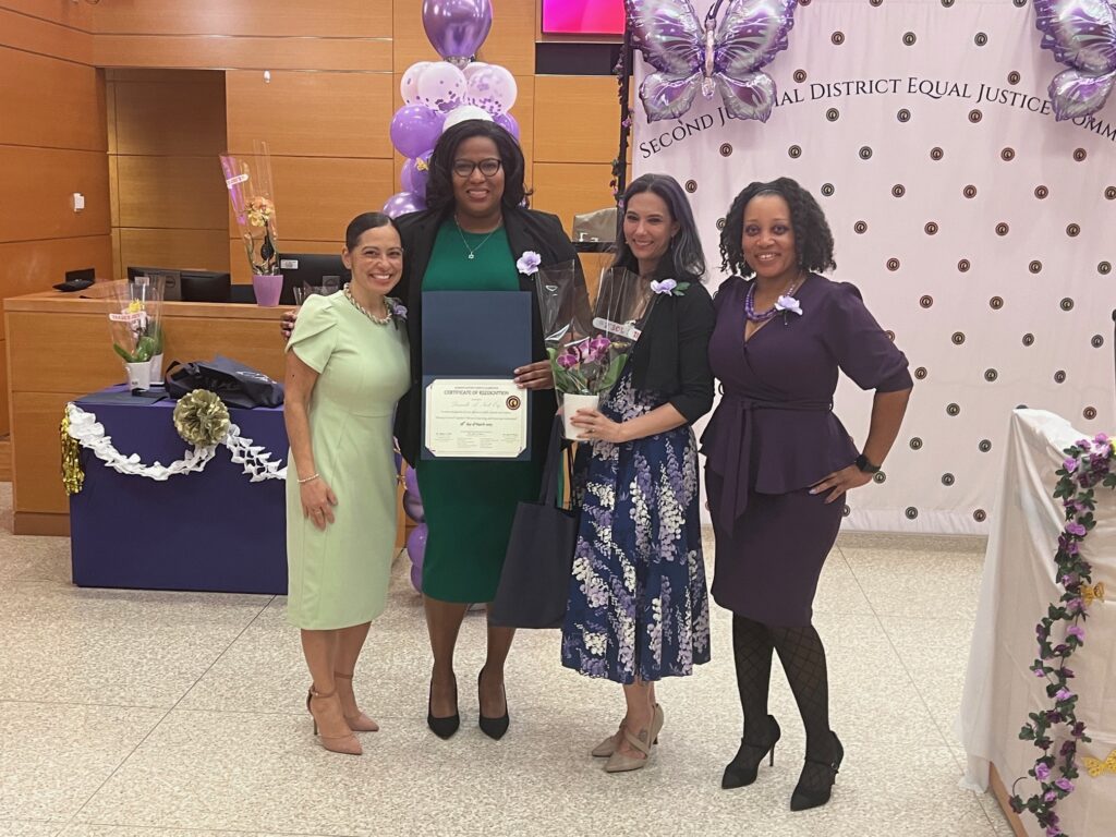 Danielle A. Noel, Esq., court attorney referee (second from left), accepting her Certificate of Recognition. Brooklyn Eagle photos by Wayne Daren Schneiderman