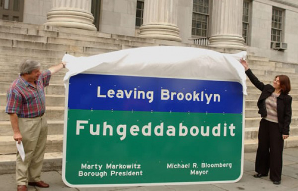 Back in the day: Former Brooklyn Borough President Marty Markowitz in 2004 unveiled the now-iconic sign on the steps of Borough Hall. Photo courtesy of Marty Markowitz