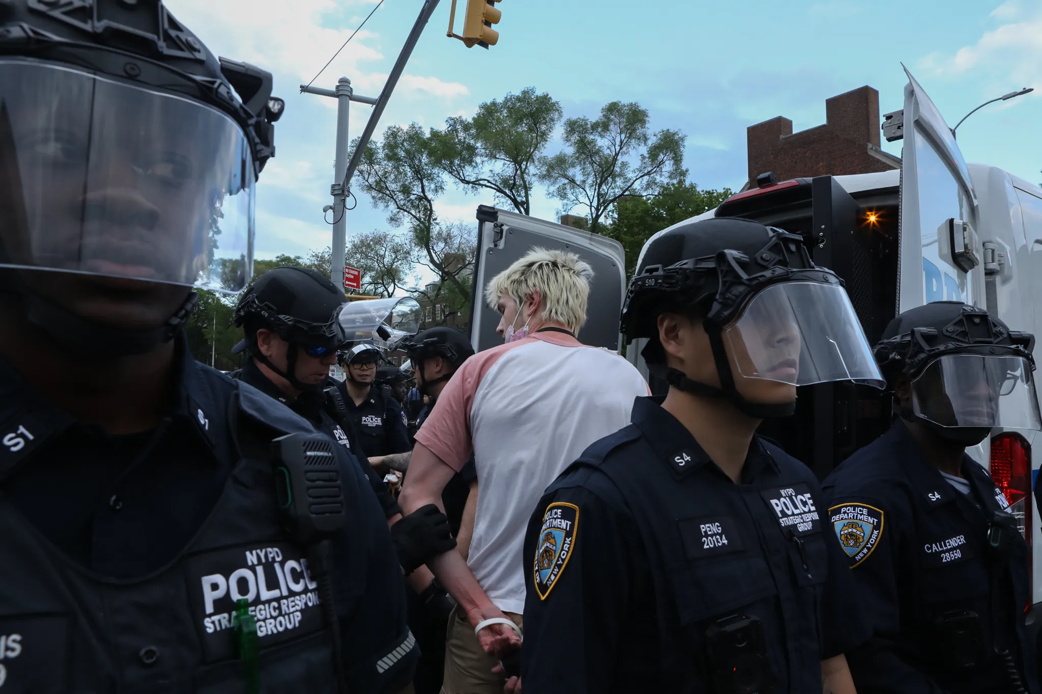 NYPD officers arrested at least a half dozen students taking part in a pro-Palestinian protest at Brooklyn College, May 8, 2025. Credit: Alex Krales/THE CITY