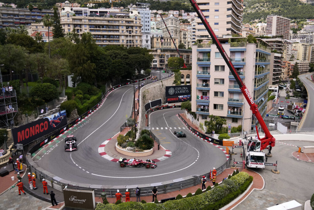 Ferrari driver Charles Leclerc of Monaco, center, steers his car during the first free practice ahead of the Formula One Monaco Grand Prix race at the Monaco racetrack in Monaco, Friday, May 23, 2025.