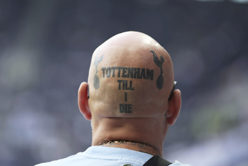A Tottenham's fan enters to the White Hart Lane stadium prior to the Europa League semifinal first leg soccer match between Tottenham Hotspur and Bodo/Glimt in London, Thursday, May 1, 2025.