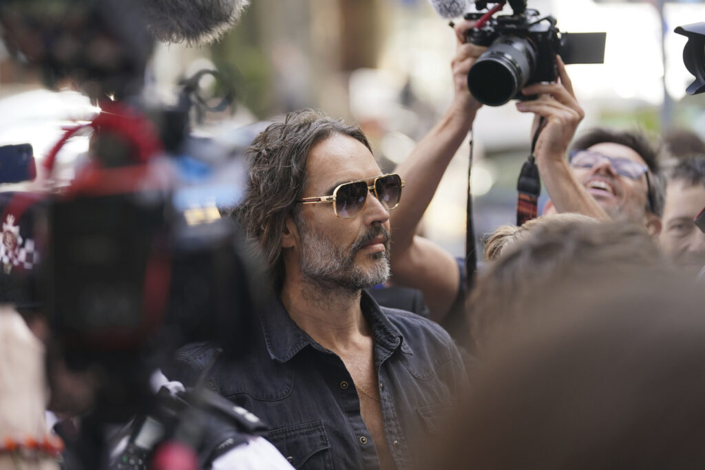 Actor--comedian Russell Brand arrives at Westminster Magistrates' court in London, Friday, May 2, 2025, to face charges of rape and sexual assault involving four women.