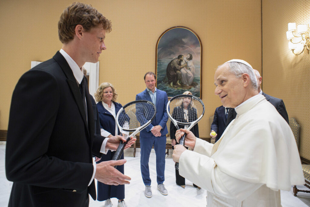 Italy's Jannik Sinner, left, shares a light moment with Pope Leo XIV on the occasion of their meeting at the Vatican, Wednesday, May 14, 2025.