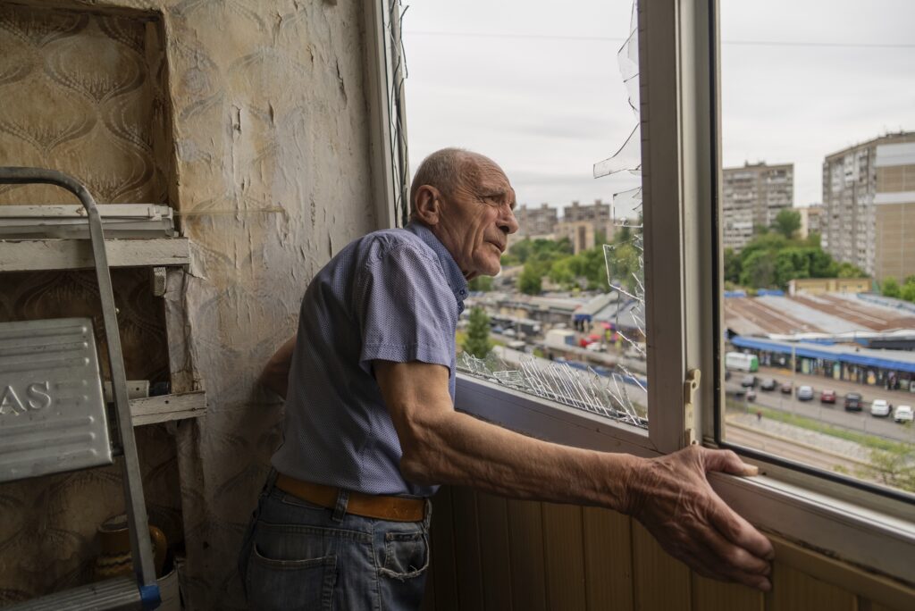 Vasyl Sievastianov, checks damage to his apartment, following a Russian strike in Kyiv, Ukraine, on Wednesday, May 7, 2025.