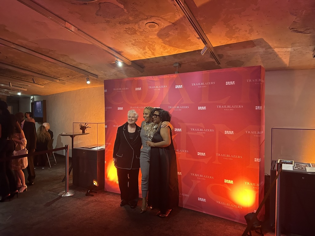 Amy Cassello, Laurie Cumbo and Tamara McCaw pose for photos during the BAM Gala cocktail hour. Brooklyn Eagle Photo by Joanna Inco