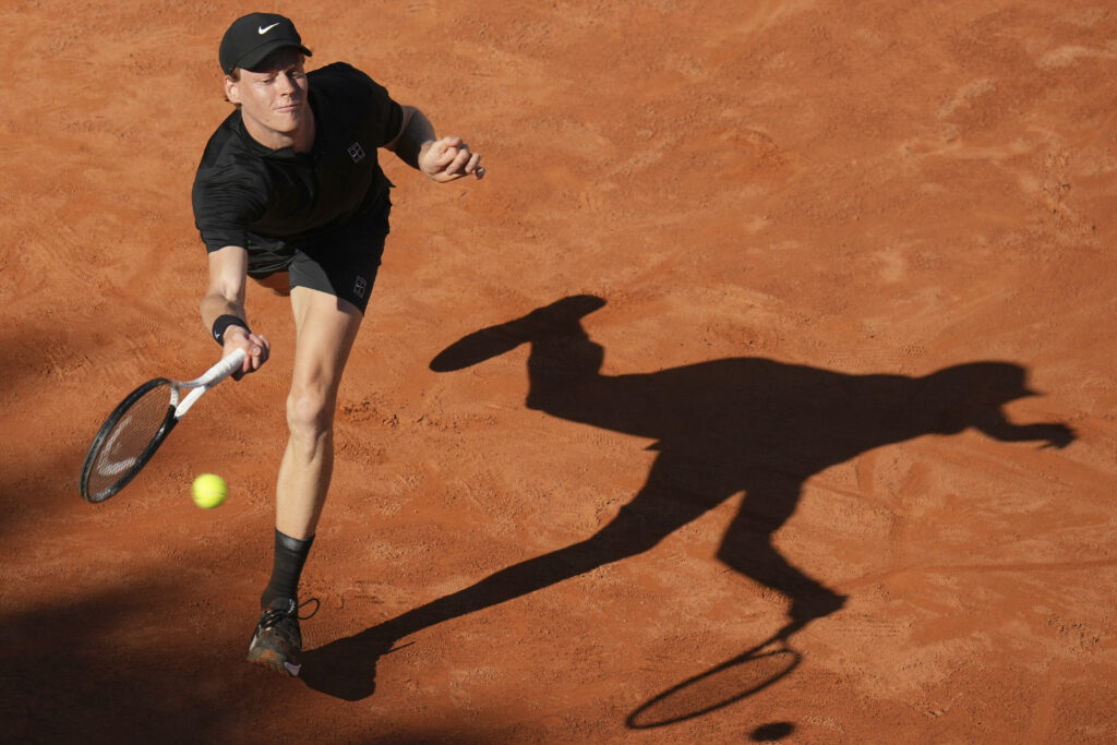Italy's Jannik Sinner returns the ball to Netherlands' Jesper De Jong during their tennis match at the Italian Open at the Foro Italico, in Rome, Monday, May 12, 2025.