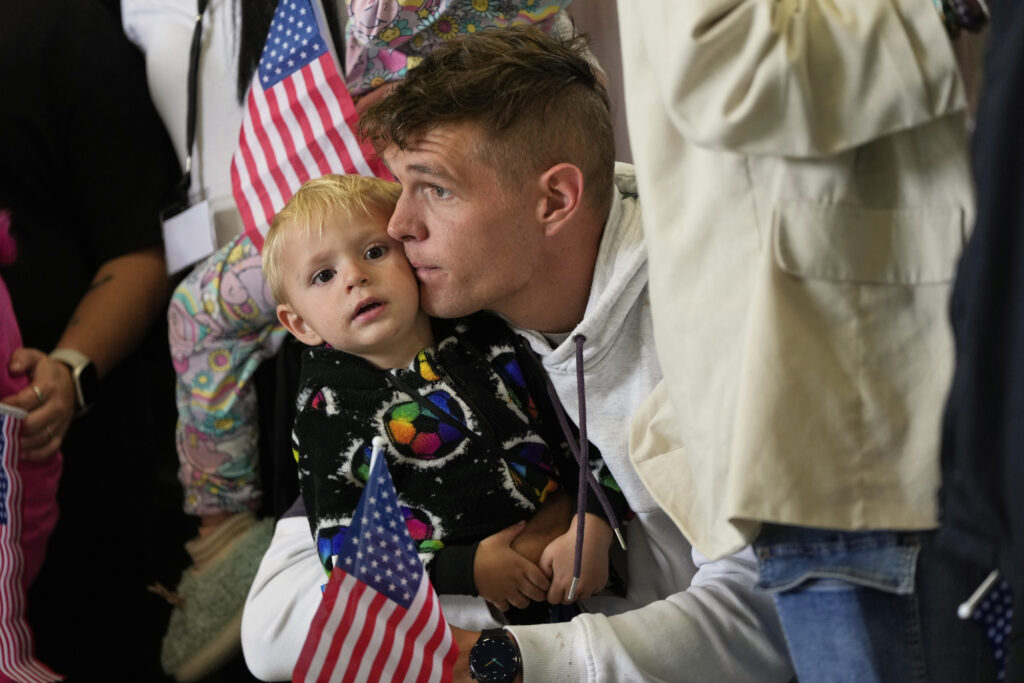 Afrikaner refugees from South Africa arrive, Monday, May 12, 2025, at Dulles International Airport in Dulles, Va.