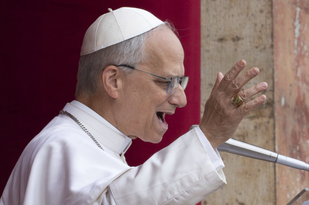 Pope Leo XIV speaks from the central balcony of St. Peter's Basilica from where he delivered his first Sunday blessing since his election to the faithful gathered in St. Peter's Square for the traditional Regina Caeli prayer at noon, on Sunday, May 11, 2025.