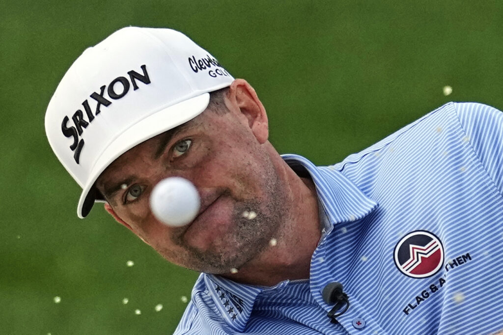 Keegan Bradley hits from the bunker on the 13th hole during a practice round for the PGA Championship golf tournament at the Quail Hollow Club, Tuesday, May 13, 2025, in Charlotte, N.C.