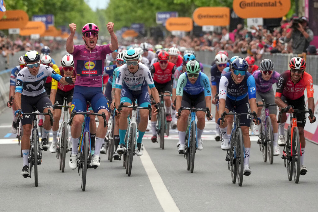 Denmark's Mads Pedersen celebrates as he crosses the finish line to win the third stage of the Giro d'Italia cycling race, from Vlore to Vlore, Albania, Sunday, May 11, 2025.