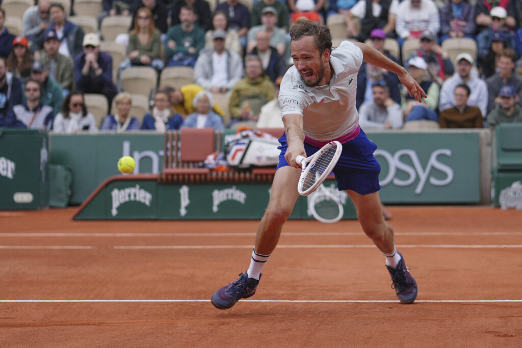 Russia's Daniil Medvedev returns the ball to Britain's Cameron Norrie during their first round match of the French Tennis Open, at the Roland-Garros stadium, in Paris, Tuesday, May 27, 2025.