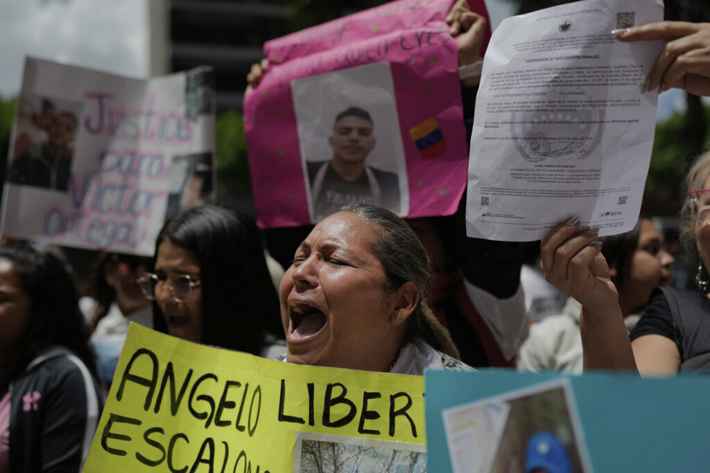 ​​The relatives of Venezuelan migrants in the U.S. who were flown to a prison in El Salvador by the U.S. government, who alleged they were members of the Tren de Aragua gang, protest outside the United Nations building in Caracas, Venezuela, Wednesday, April 9, 2025. Photo: Ariana Cubillos/AP