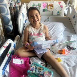 A pediatric patient enjoying games on her tablet during a recent visit to Maimonides Children's Hospital. Photo courtesy Maimonides Children's Hospital