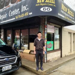New Xcell Auto Repair owner Eric Han stands in front of his shop, which has been targeted by hundreds of 311 complaints filed by the same person. Photo: Mary Frost, Brooklyn Eagle