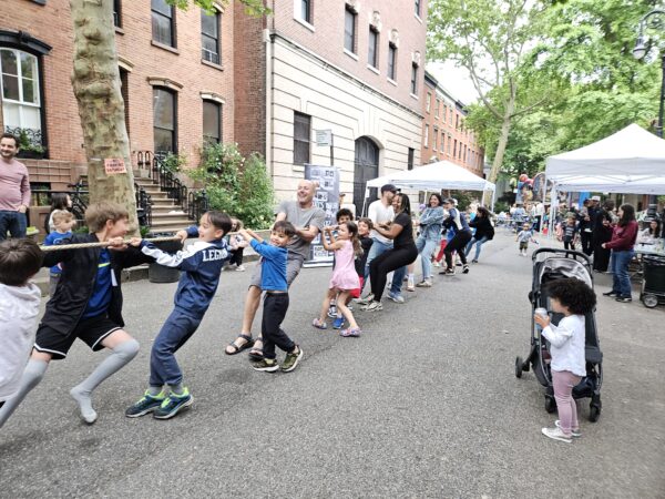 An old-fashioned tug-of-war at the Willowtown Spring Fair. Photo by Linda DeRosa