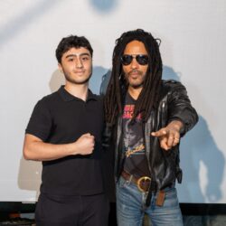 Essay winner Jonathan D. with Lenny Kravitz. Photo courtesy of The Soloviev Foundation