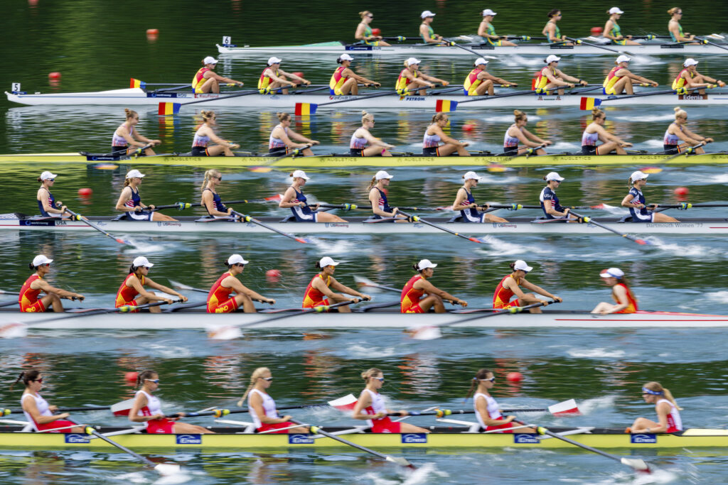 The teams of Australia, Romania, Germany, the United States, China and Poland, from top, compete in the Women's Eight preliminary race on the first day of the 2025 World Rowing Cup at Rotsee in Lucerne, Switzerland, on Friday, June 27, 2025.