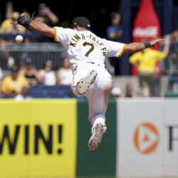 Pittsburgh Pirates shortstop Isiah Kiner-Falefa knocks down a ball hit by Miami Marlins' Eric Wagaman before fielding it to make the out at first during the eighth inning of a baseball game Wednesday, June 11, 2025, in Pittsburgh.