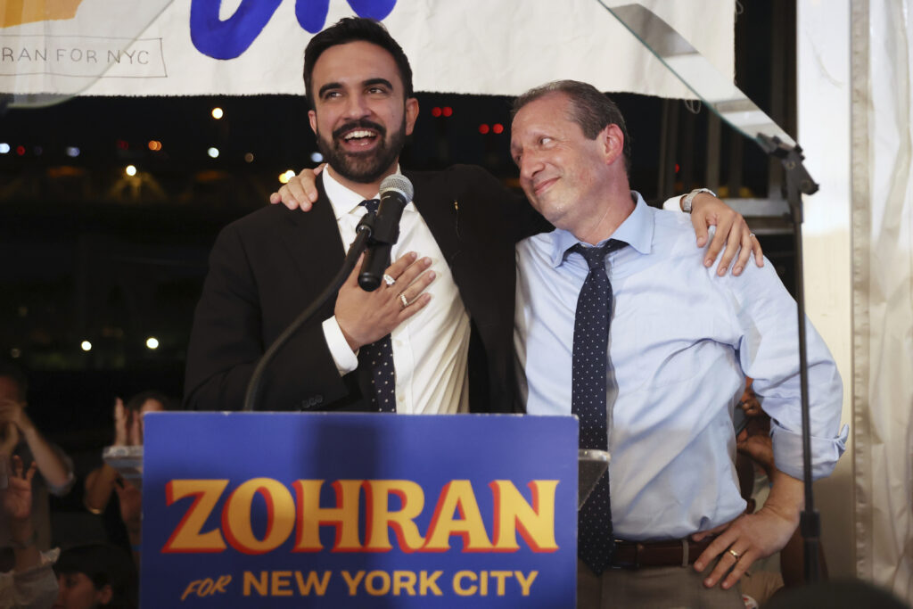 Democratic mayoral candidate Zohran Mamdani, left, speaks on stage with fellow candidate Comptroller Brad Lander at his primary election party, Wednesday, June 25, 2025, in New York.