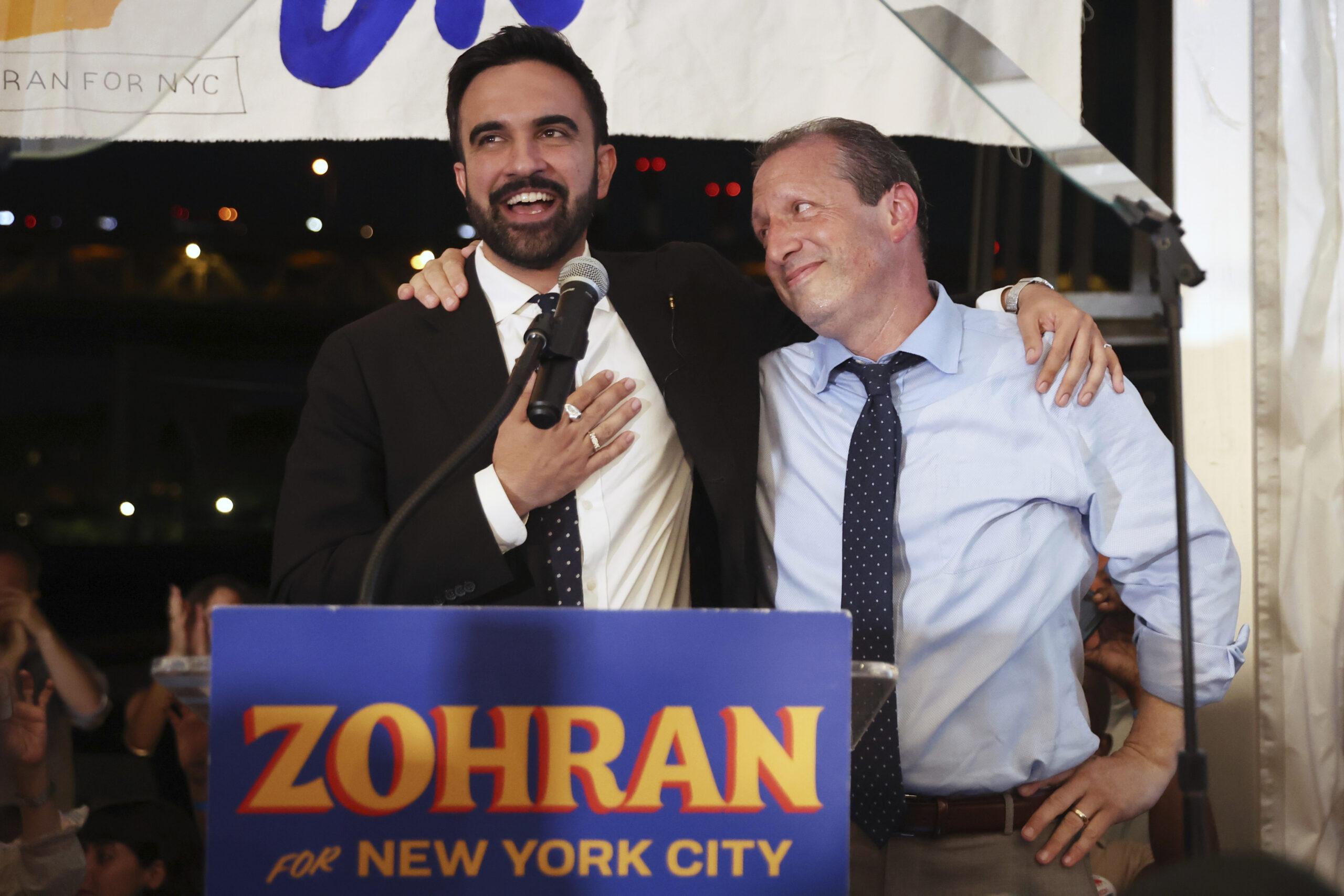 Democratic mayoral candidate Zohran Mamdani, left, speaks on stage with fellow candidate Comptroller Brad Lander at his primary election party, Wednesday, June 25, 2025, in New York.
