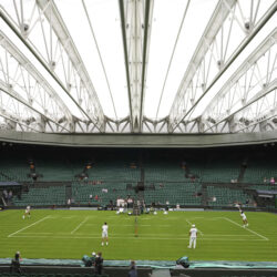 Carlos Alcaraz of Spain, right, and Novak Djokovic of Serbia, left, during a practice session on Centre Court at the All England Lawn Tennis and Croquet Club, ahead of the Wimbledon Championships in London, Thursday, June 26, 2025.
