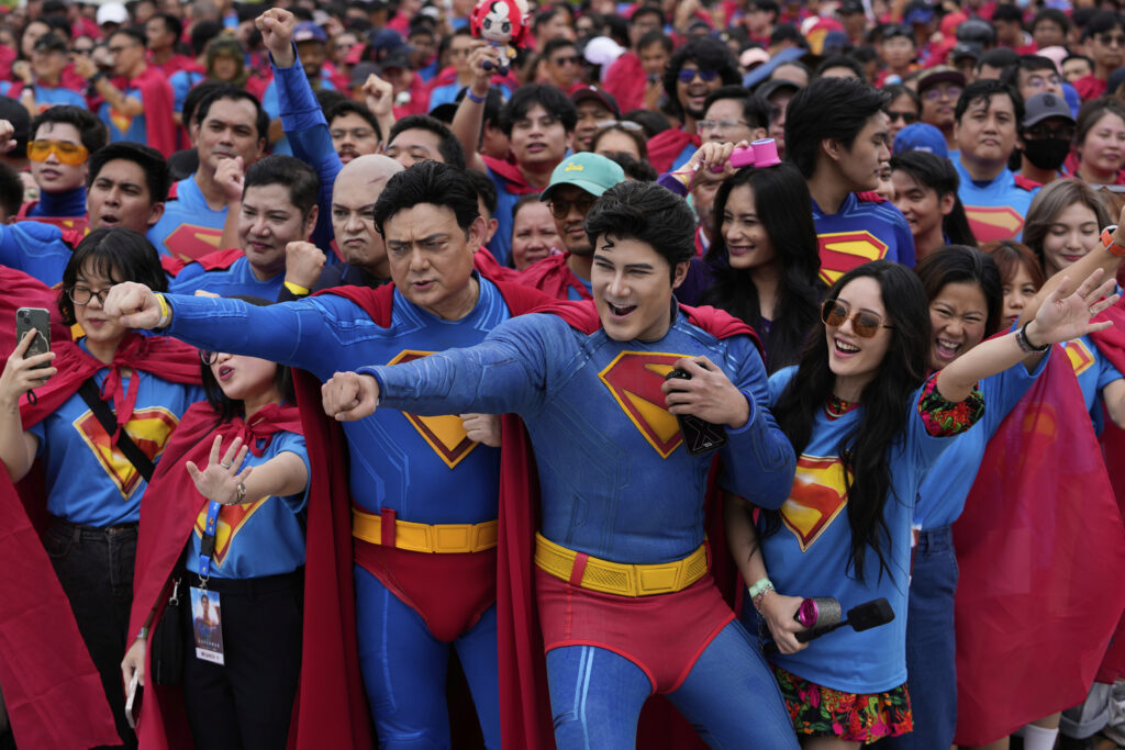 Superman fans dressed in costumes pose during an event as part of the first stop of the Superman World Tour in Pasig city, Philippines on Thursday June 19, 2025.