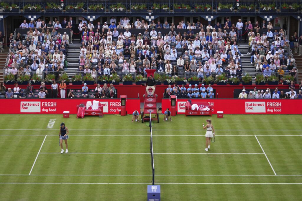Britain's Katie Boulter, right, celebrates winning a point against Australia's Ajla Tomljanovic during her women's singles match at the Queens Club grass court tennis championships in London, Tuesday, June 10, 2025.