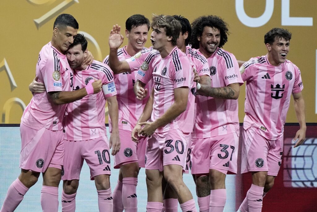 Inter Miami's Lionel Messi, second left, celebrates with Luis Suarez after scoring his side's second goal during the Club World Cup group A soccer match between Inter Miami and FC Porto in Atlanta, Thursday, June 19, 2025.