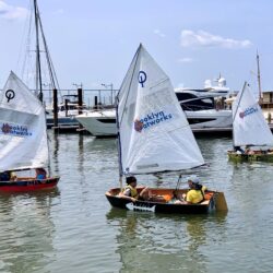 About 200 middle school students launched their hand-made sailboats at Brooklyn Bridge Marina on June 11. Photo: Mary Frost, Brooklyn Eagle