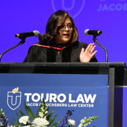 Justice Cheryl Chambers speaks to the Touro Law Center Class of 2025 during commencement on June 2. Chambers, now a senior justice in the Appellate Division, Second Department, shared that she never attended her own law school graduation. Speaking at Touro, she said, “Being here fills that space in my heart.” Photo courtesy of Touro Law Center