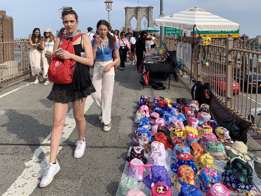 Before vending on the Brooklyn Bridge was prohibited in January 2024, sellers often took up almost an entire pedestrian lane. Photo: Mary Frost, Brooklyn Eagle