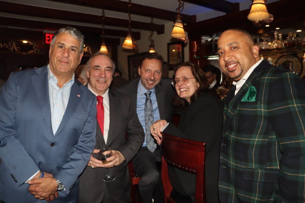 Brian Chin, far right, and guests. Brooklyn Eagle Photo by Mario Belluomo