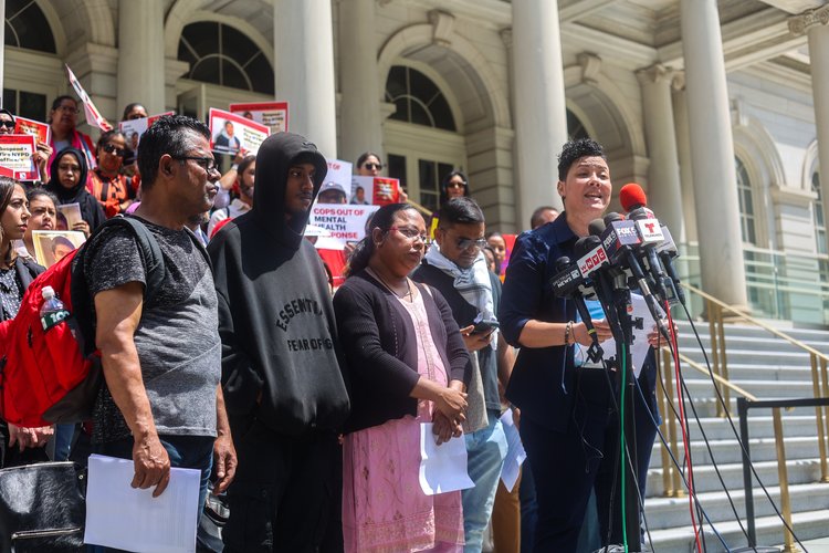 Win Rozario’s mother, Notan Eva Costa, alongside her son, Utsho Rozario, left, at a press conference on the steps of New York City Hall Wednesday, May 8, 2024 in Manhattan, New York. Brooklyn Eagle photo